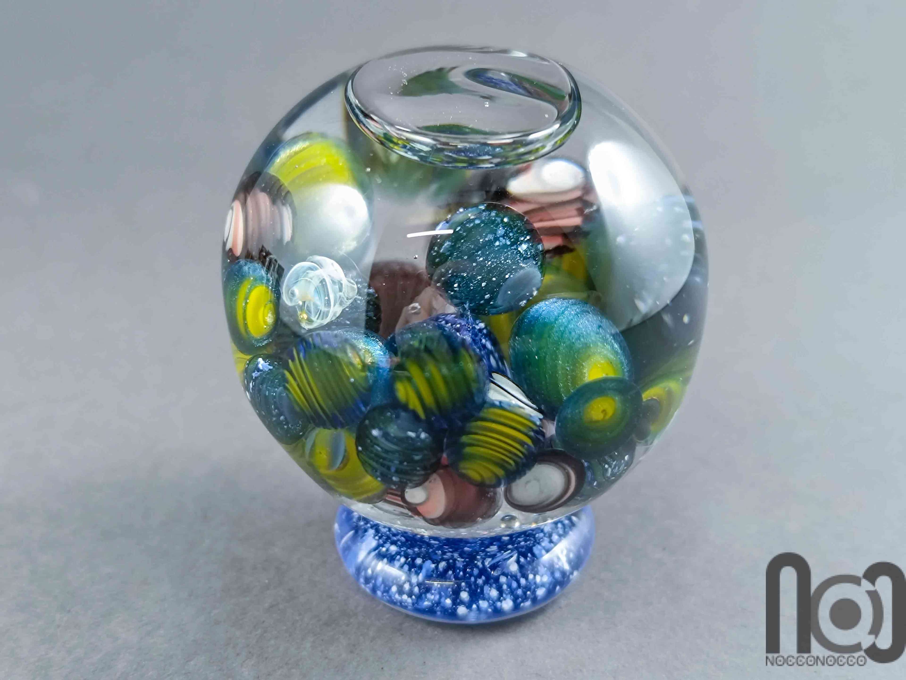 Glycerin-Filled Handmade Glass Marble with Floating Mini Marbles, v590 — handmade borosilicate glass by NoccoNocco, made in Greece