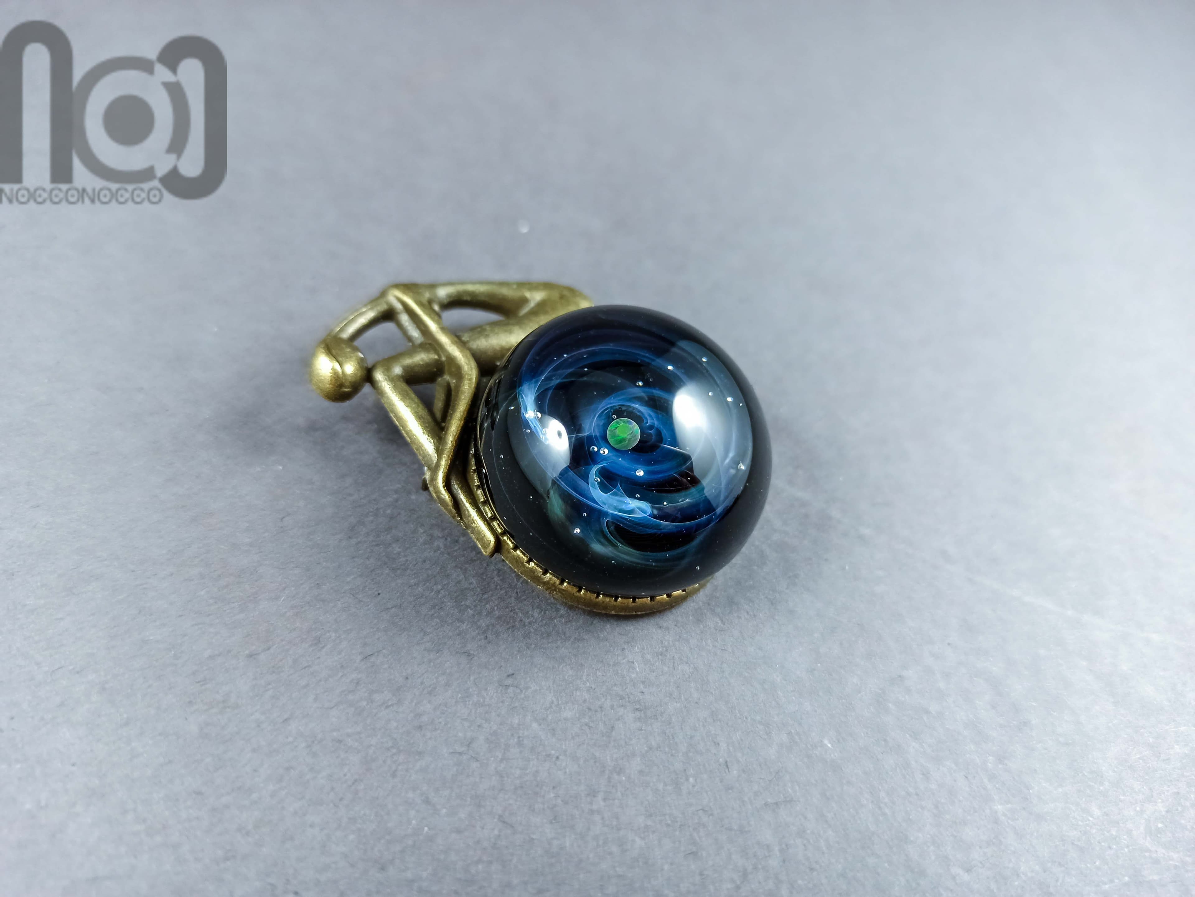 Handmade Antique Bronze Brooch with Glass Galaxy and An Opal Planet — handmade borosilicate glass by NoccoNocco, main view, made in Greece