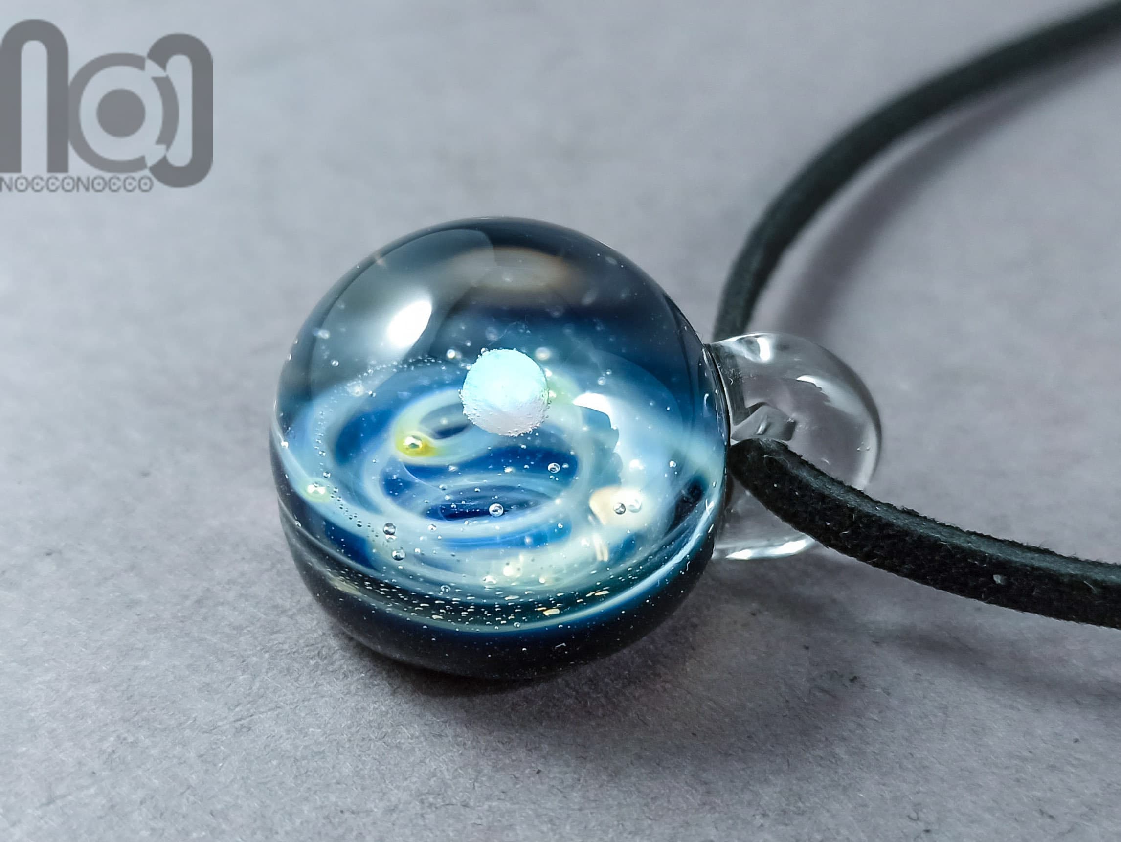 Galaxy Pendant with An Opal Planet, v193 — handmade borosilicate glass by NoccoNocco, main view, made in Greece