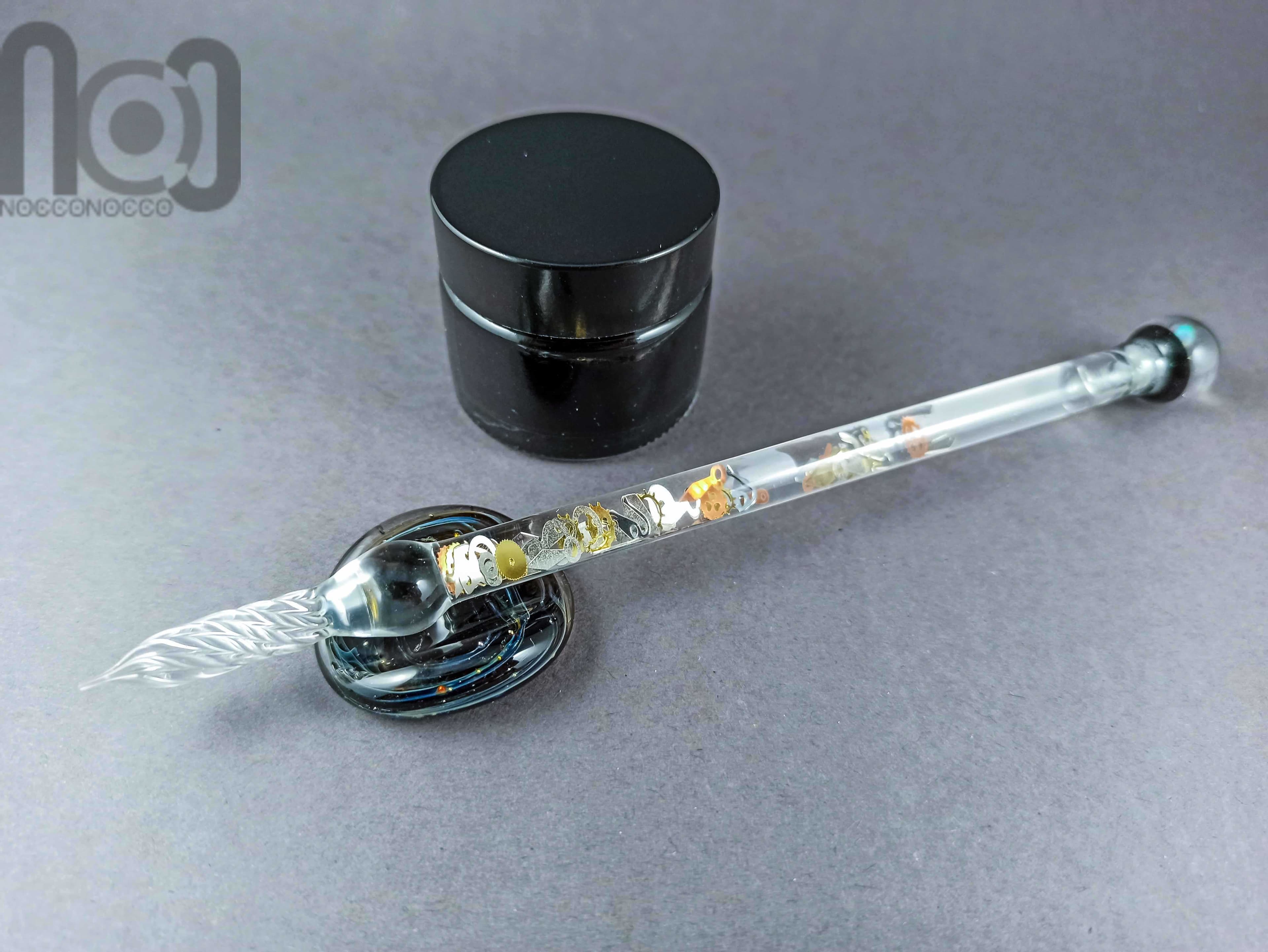 Glass Dip Pen filled with floating cog and gears, and a galaxy marble on top, v045 — handmade borosilicate glass by NoccoNocco, main view, made in Greece