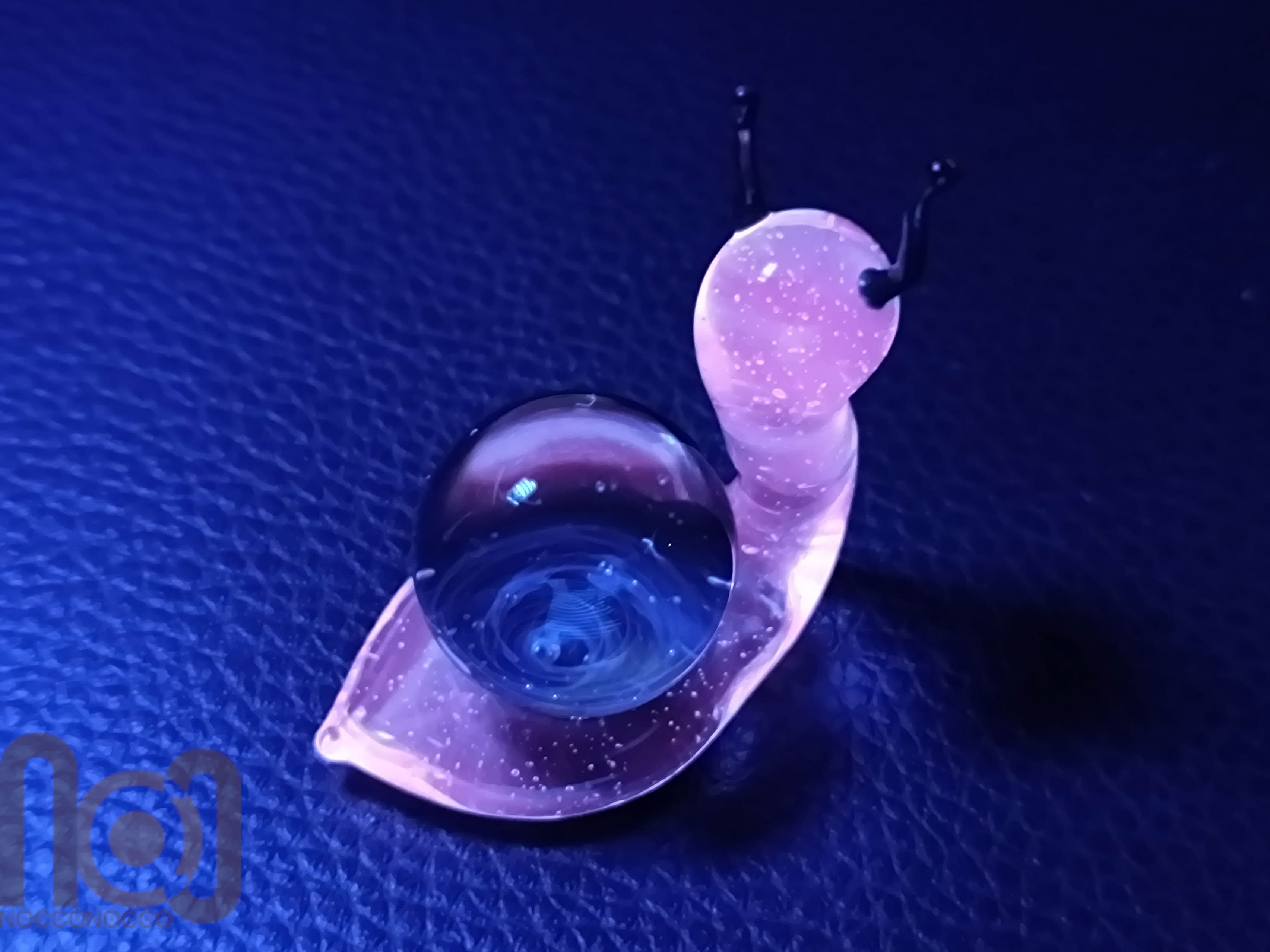 UV Reactive Galaxy Snail, v476 — handmade borosilicate glass by NoccoNocco, main view, made in Greece
