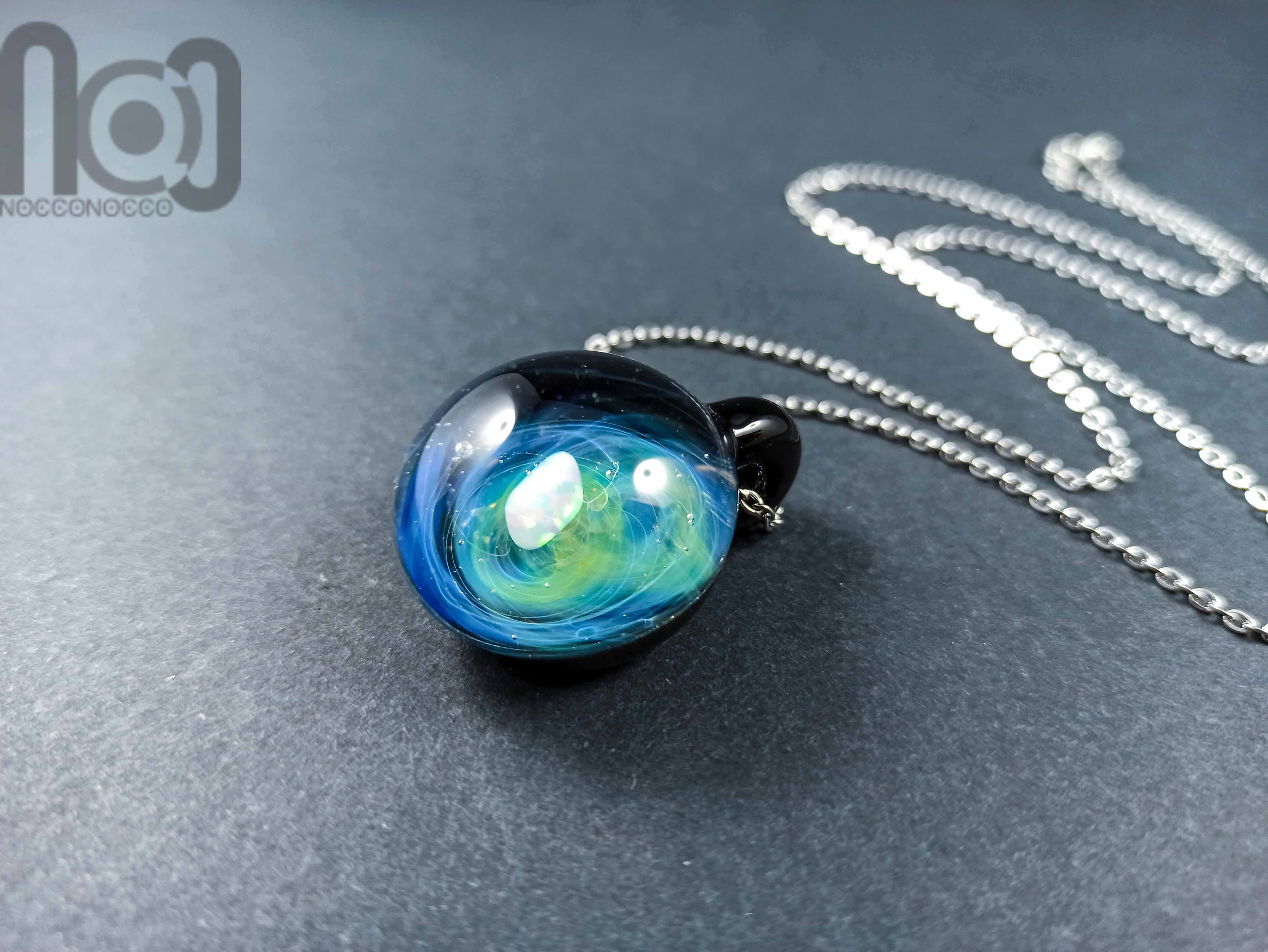 Galaxy Pendant with An Opal Meteor, v120 — handmade borosilicate glass by NoccoNocco, main view, made in Greece