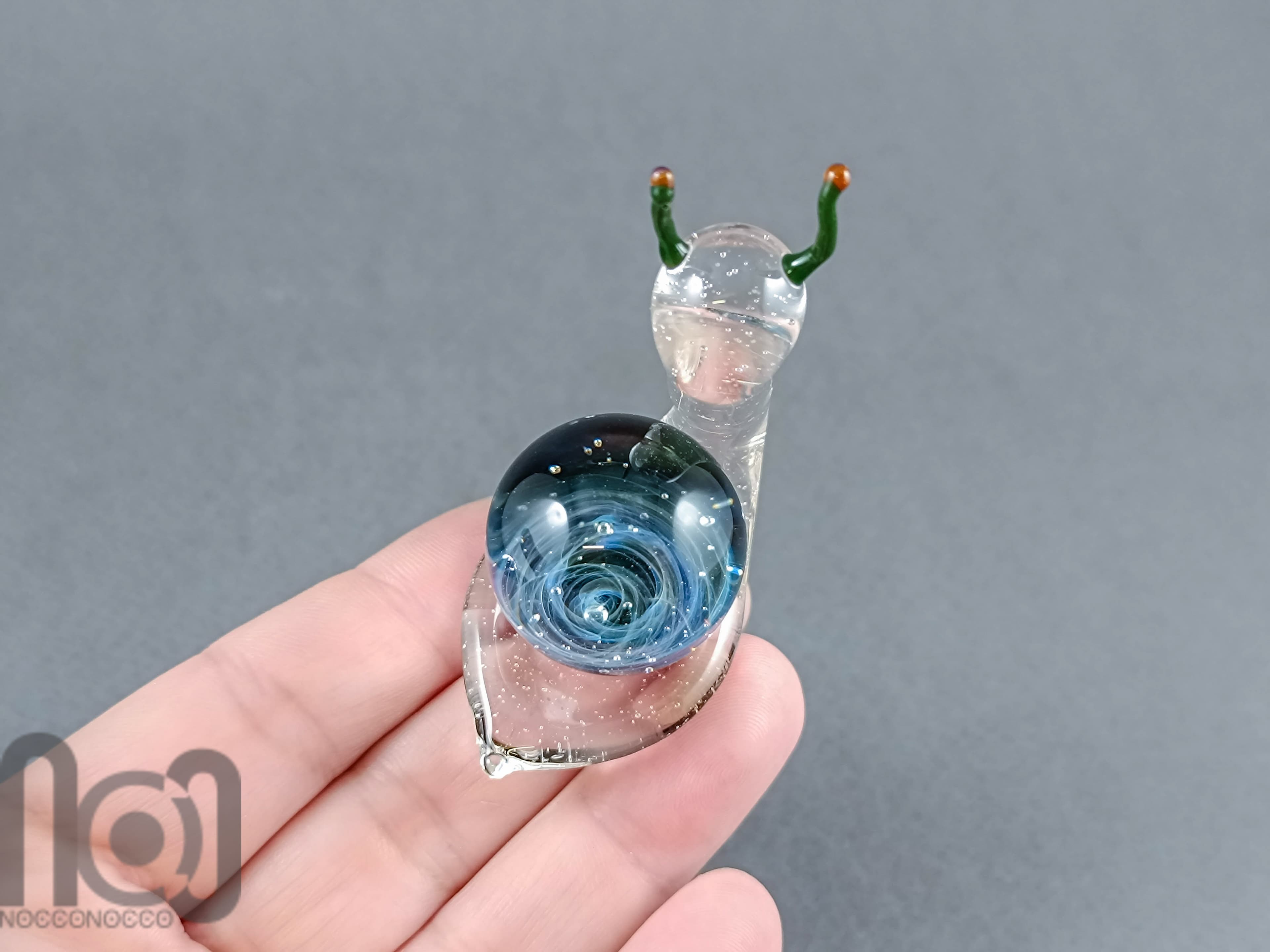 UV Reactive Galaxy Snail, v476 — handmade borosilicate glass by NoccoNocco, detail view 3 of 3, made in Greece