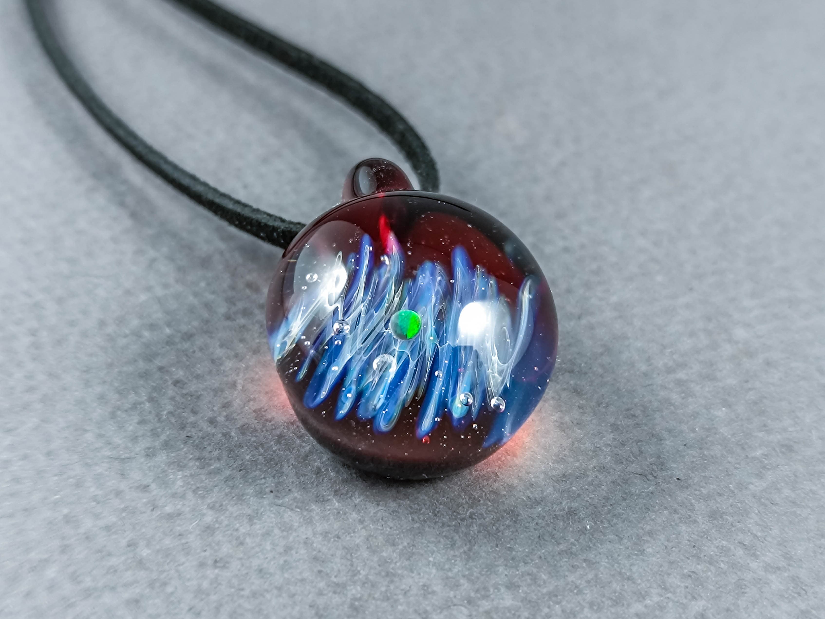 Galaxy Pendant with An Opal Planet, v316 — handmade borosilicate glass by NoccoNocco, detail view 3 of 3, made in Greece